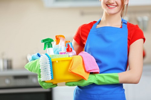 Janitorial team performing commercial cleaning in an office