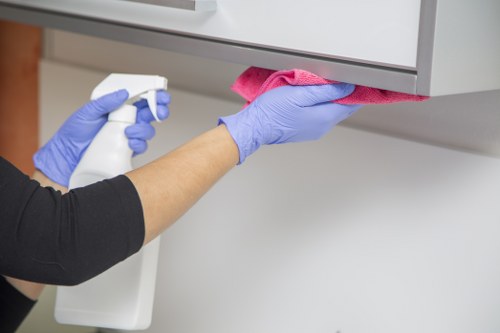 Professional cleaning of lift buttons and high-touch communal surfaces